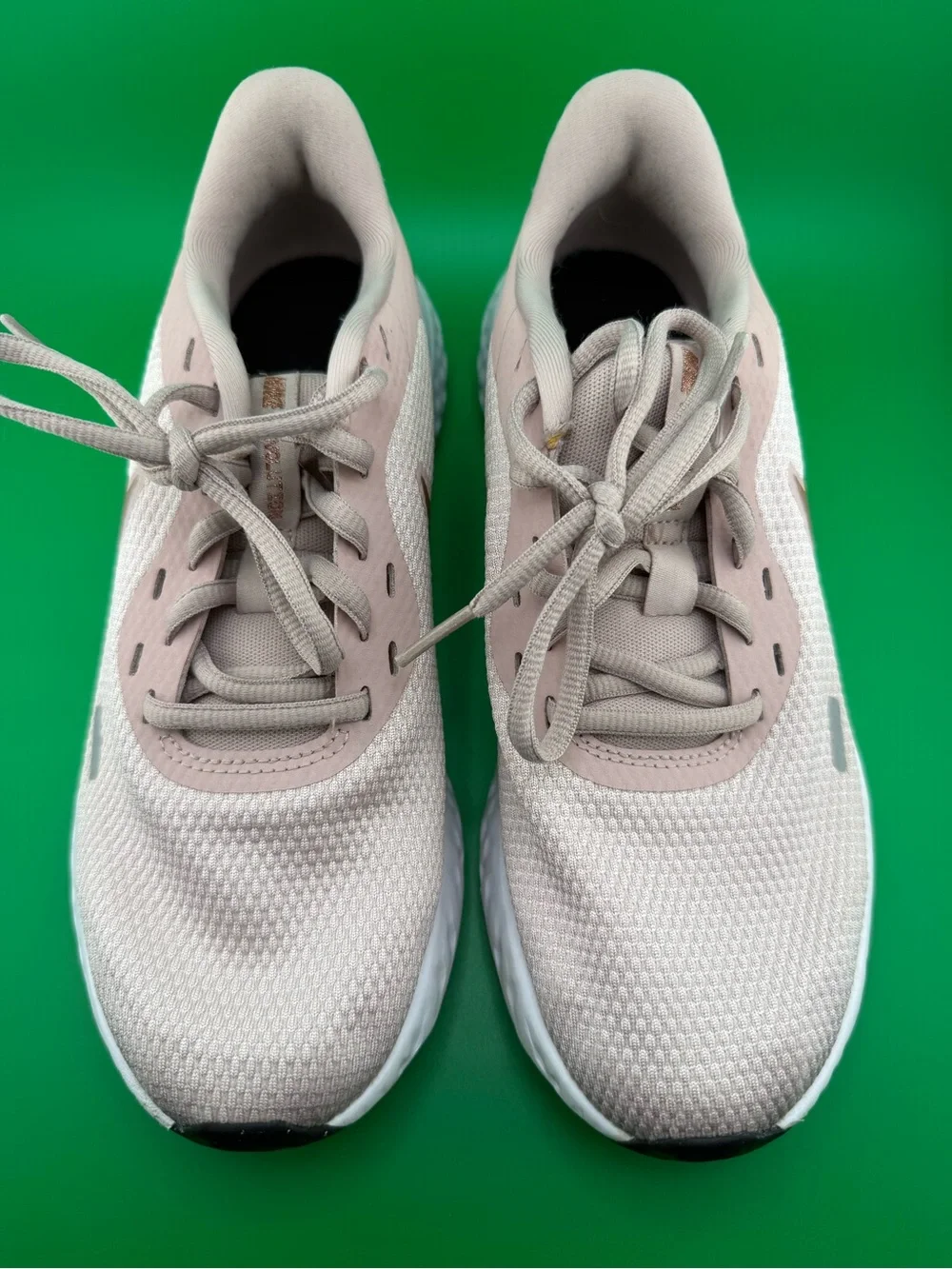 Nike Women's Blush Pink Athletic Running Sneakers with Subtle Gold Swoosh